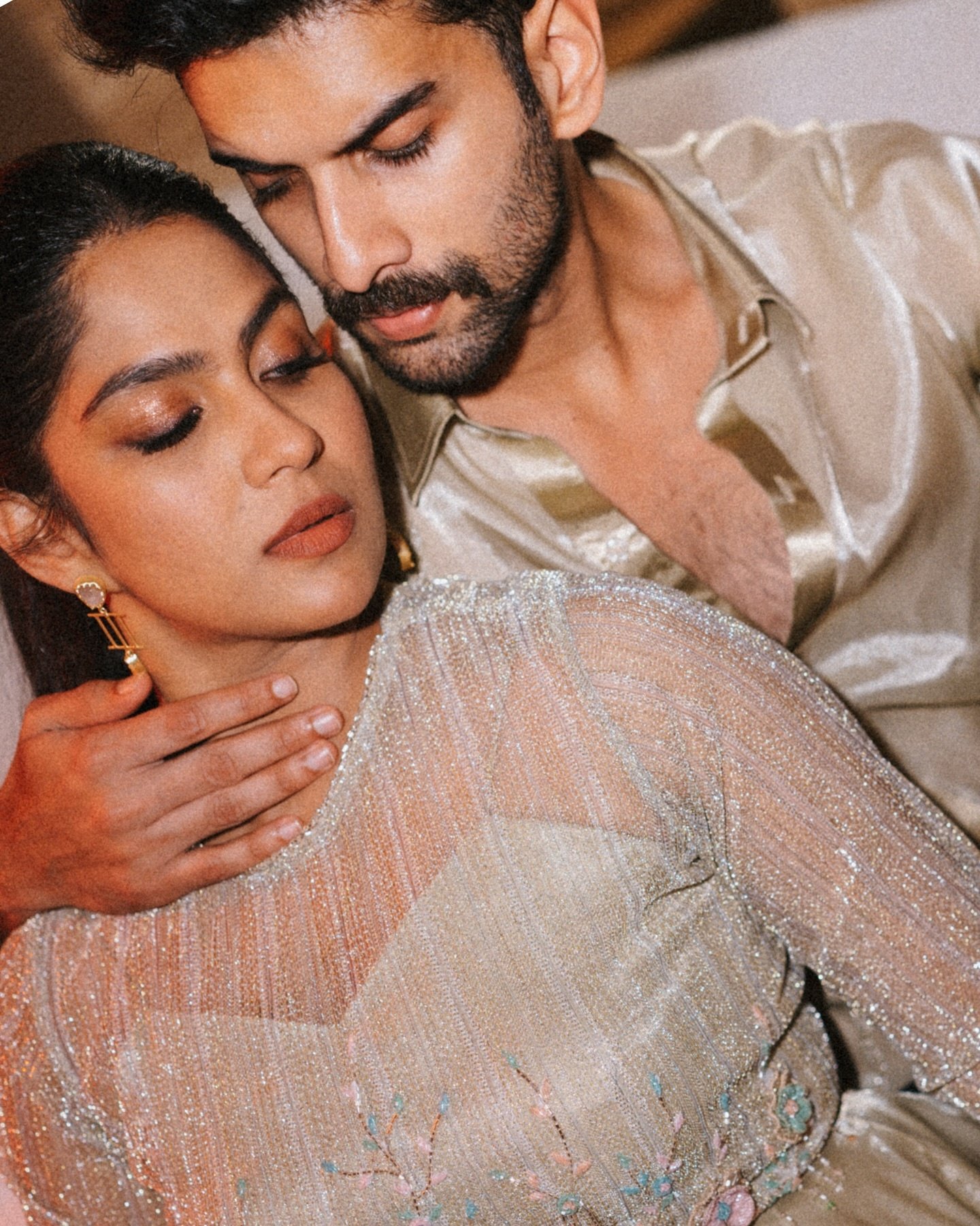 A close portrait of a couple embracing